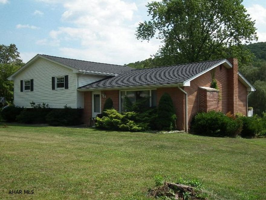 Enjoy this Brick Multi-level 4+ home with spacious rooms, plenty of space to enjoy family time or enteraining on 2.26 acres of ground. Abundance of storage space in this home with additional space in the detached 3 bay garage. Kitchen has been completely remodeled with Cabin Tree cabinets, laminate floors and eating area. Dining room has laminate floors, double hung doors leading to composite deck. Enjoy morning coffee or evening breeze as you watch nature on the 2.26 acres. Living room has large windows for your enjoyment of front acreage, allowing plenty of light during the day and at night enjoy the brick fireplace. All bedrooms are spacious with closets, 2.5 baths with game room in lower level, family room on main, 2 bonus rooms and 14 x 28 screened in patio!