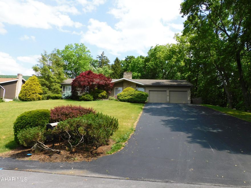 Fantastic ranch home in the Pleasant Valley Area of Altoona! Eat-in kitchen with tile floors. Lovely formal dinning room that walks you out to an outdoor deck. Spacious living room that has a cozy gas fireplace. Primary bedroom has 2 closets and a 1/2 bath. Huge family room, a full bath and a 4th bedroom in the finished basement. Bonus room and utility room in basement provides tons of storage. Plenty of parking with an attached 2 car garage. Beautiful curb appeal and a private yard. This home would be great for a large family or a buyer looking for first floor living.