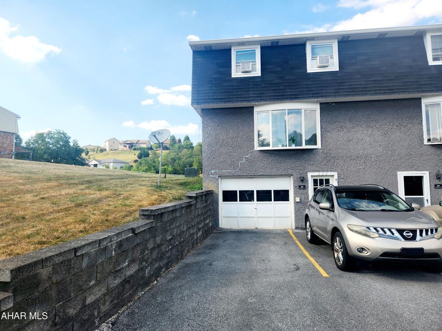 This cozy townhouse offers 3 bedrooms and 1 bathroom, and is an end unit with parking in front and rear. The main level has an open floor plan with living room, dining room, kitchen and leads to back deck. The upper level offers three bedrooms and full bathroom. Enjoy the convenience of a bonus room in the lower level, ideal for a home office, playroom, or guest space. Enjoy access to community amenities with a low HOA fee of $200 per month. HOA includes: lawn care, snow removal, roof, deck, exterior maintenance, swimming pool, basketball/tennis courts, snow removal, and trash.  Call listing agent for more information or your tour.