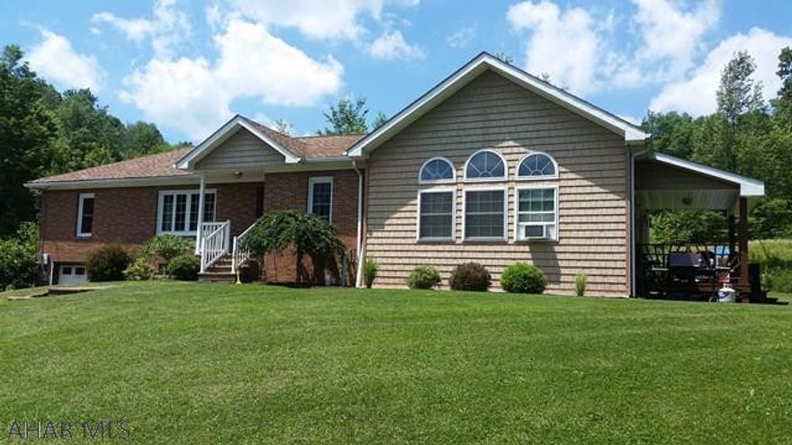 Well maintained and well built home with some hardwood floors, newer addition. Also has an outside wood and soft coal furnace in addition to the oil Hot water furnace