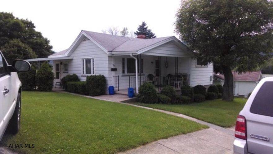 Adorable 2 bedroom home on 3 lots with a detached 1 car garage, an additional 2 car garage and outbuilding. 2 car garage has a pit. Also has an in ground swimming pool. Hardwood floors in living room under carpet. Washer/dryer hookups on 1st floor as well as basement. Beautiful flat lots and a great view. House is on a dead end street.