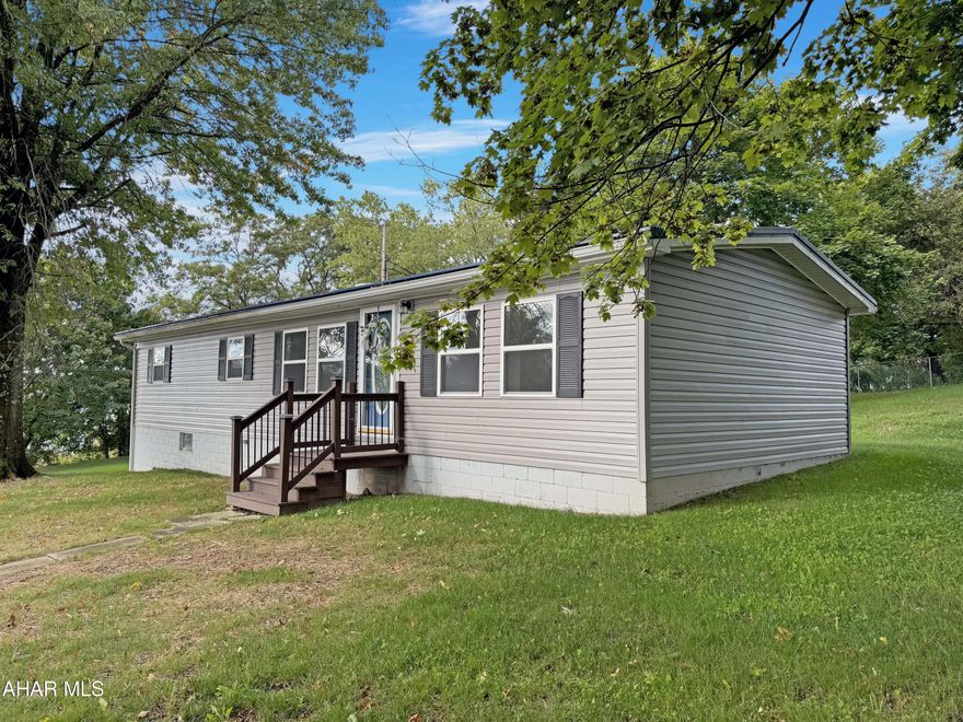 Welcome to 415 S Caroline Street in the charming borough of Ebensburg, Central Cambria School District. This stunning ranch-style home is situated on a spacious corner lot & has recently undergone a complete renovation. Key highlights include a brand-new heating system, upgraded electrical & plumbing, new flooring throughout, a beautifully designed kitchen w/ ample cabinetry, fresh siding, a durable metal roof, a new hot water tank, & much more! As you step inside, you'll be welcomed by an inviting open floor plan, featuring a generous living room, a cozy dining area, a stylish kitchen, three well-appointed bedrooms, a fully updated bathroom, & a convenient laundry space. The unfinished basement offers incredible potential—it can be transformed into additional living space or used for storage & garage purposes. Outside, you'll find a large rear deck perfect for entertaining, a detached one-car garage, & the expansive corner lot that provides endless possibilities for outdoor enjoyment. Don't miss your chance to make this beautifully renovated home your own! Contact us today for more information.
