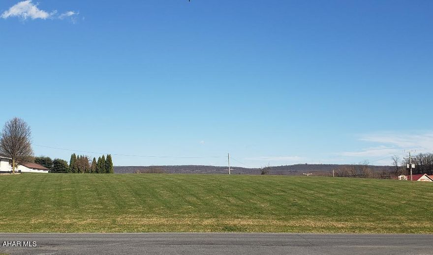 Beautiful location 2.52 Acres in North Woodbury Twp just on the outskirts of Martinsburg with great views and lovely neighborhood. Tap onto public water and sewer (Buyer to verify tap + fees). Great place to ride bike or walk to Morrison Cove Memorial Park for bowling, little league field, pool or other activities. J-642