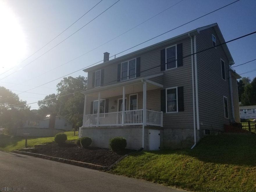 Completely renovated home, starting at the studs! This home features a wonderfully large kitchen with an island and stainless steel appliances, an office with built in shelves and French doors for ultimate privacy, additional bonus room on first floor, a dream mudroom with a short walk to a 22x26 garage, second floor laundry, and an amazing master suite complete with double vanities and tiled shower. The amazing yard, covered porch, pergola, and above ground salt water pool will be the highlights of your summer. If you are looking for move-in-ready, updated, clean, and no work needed... this is the home for you and your loved ones!