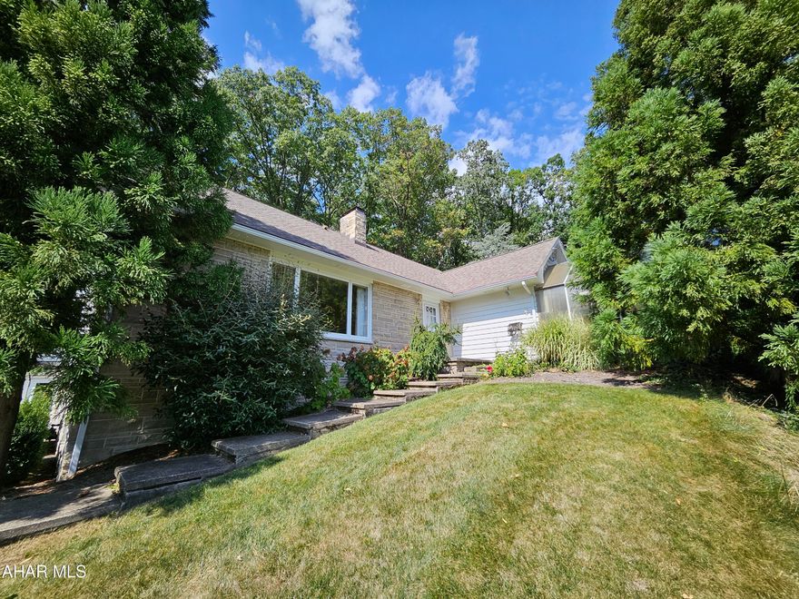 If you are seeking abundant space, this is it!  This 4 bedroom features 2 family rooms, a huge living room, formal dining room and a very bright and happy sunroom!  It boasts a greenhouse, hot tub/spa room and an official Olympic length lap pool!  3 sheds, 2 car garage, extremely private 0.88 acre on a dead end street!