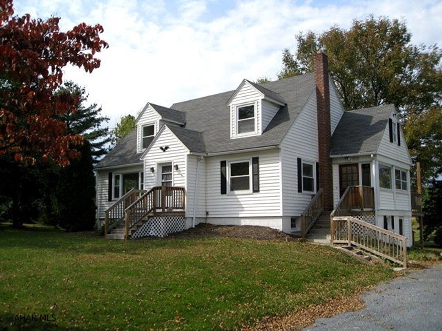 Solid, well-maintained Cape Cod w/ 3 BR (one on 1st floor) and 2 BA. Almost new stove and dishwasher. Hardwood floors in much of home. Two-car detached garage.