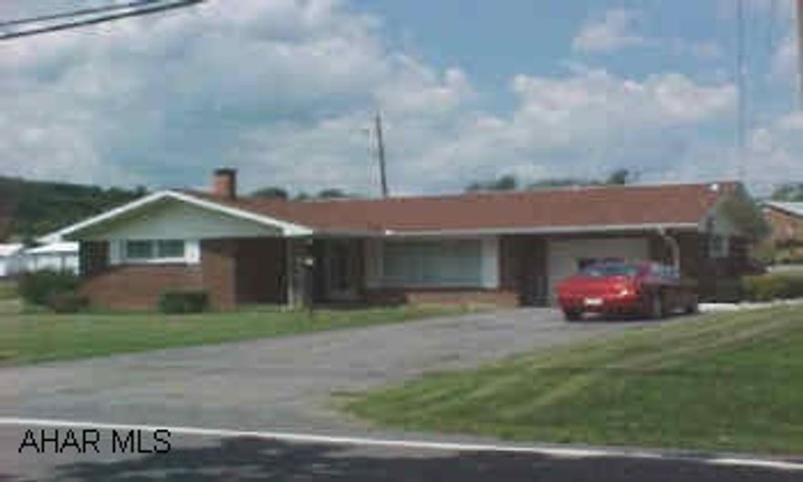 NIce brick ranch, double corner lot. Wet bar in basement.  2 Sanyo wall mounted air-conditioning units. Hardwood floors under the carpets. Call for List of updates with sellers disclosure.Enclosed back porch. Lots of attic storage