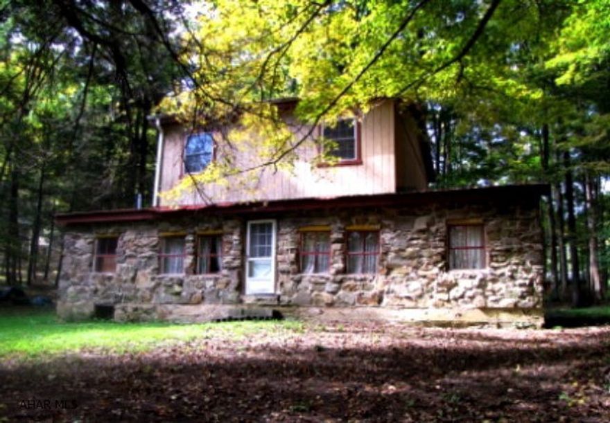 Perfect Hunting Camp! Has 4 bedrooms, 2 on first floor and 2 on second floor. Renowned trout stream of Penns Creek in Centre County. Creek is a few hundred feet from the house! Great view of Creek! Wooded lot! Property has an Outhouse. Property has wood and oil heat. No water. Very private and secluded. Beautiful, picturesque view of the stream.