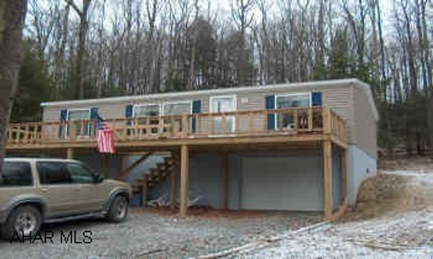 Great doublewide w/ 1 car integral garage & full basement