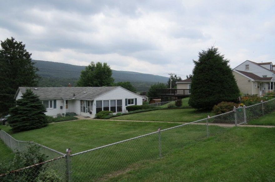 Located on a quiet street, this house sits on a fenced lot with updated mechanics, it just needs someone to add their finishing touches. Central air 2007, back-up generator 2005, furnace 2007, windows 2002, bathroom 2007.