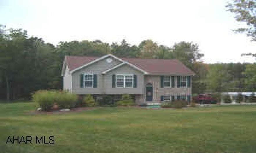 4 year old brick & vinyl bi-level on 1.46 acres in Warriors Mar. 3 BR, 1 3/4 BA, open floor plan, 2x6 walls throughout, pavillion area, organic landscaping, surrounded by woods. Please do not let cat out & leave dog in cage.