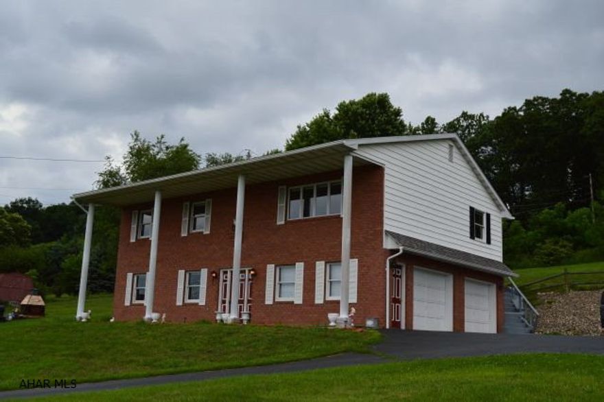 This home is located in a great neighborhood in a prime location between Hollidaysburg and East Freedom. 4 Bedroom, 2 bath, 2 car garage. Large basement with a bedroom also includes a second kitchen. Great views. Located in Hollidaysburg school district.