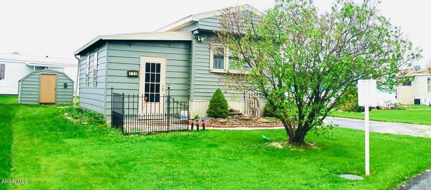 Welcome to Wise Mobile Home court!  Have you been looking for a spacious, charming one bedroom home?  Here it is!  This 1972 Baron single wide mobile home has had many upgrades throughout the years.   New vinyl siding, new water pipes under the home, and an enclosed porch are just a few of the updated items this home has to offer. Upon entering the front door, you will walk into a huge living room.  There is plenty of space for your living room furniture and an entertainment unit.  This room features two large windows; each covered with an awning to block out the glare from the sun. but still allowing lots of sunshine into the home.   Look out to see the kitchen and dining room area.  Kitchen contains a backsplash and an updated cabinet.  There is a small pantry for storing your food. The dining room contains shelve units and a storage space beneath, as well as a bay window for your viewing needs. 
Next, enter the hallway.  The first door you find to your left is a laundry room with a small closet and a shelving unit. After this room, you will find the bathroom.  Bathroom shower is a nice sized walk-in, perfect for those who have trouble stepping over a traditional tub entrance. At the very end of the home, you will find the bedroom. Bedroom has 3 windows for lots of natural light and a closet.  The previous owner used an additional window to put in an enclosed ac unit.  Outside you will find a large porch off of the back door exit.  Spend your evenings relaxing on this well-maintained porch.  Come see this home for yourself.