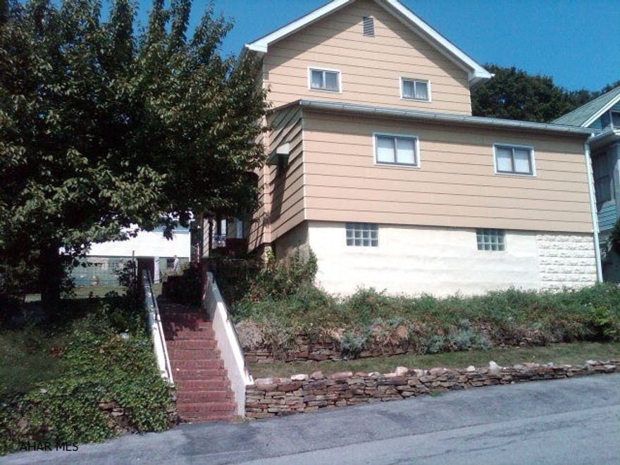 Nice built in china closet in Dining Room, home being painted inside, Furnace and roof approx 8 years old, Double pane windows on 1st floor,single with storms on second.  100 am breakers. HW tank apprx 2 yr. old.  Garage needs work, window air conditioner in Bedroom, central vac., 1st floor Bedroom and Full Bath.