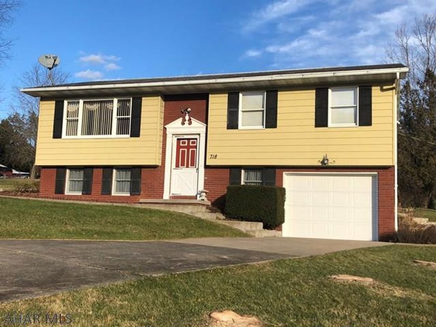 You'll see this home situated at the end of a private driveway in the majestic Hollidaysburg countryside.  This well-maintained home includes 2 bedrooms upstairs, with the possibility of a 3rd bedroom on lower level.  Entertain guests or relax under the covered back patio.  Kitchen has very efficient layout with easy access to dining area.  So many possibilities in this home to make it your own!  Ask to see this house today!