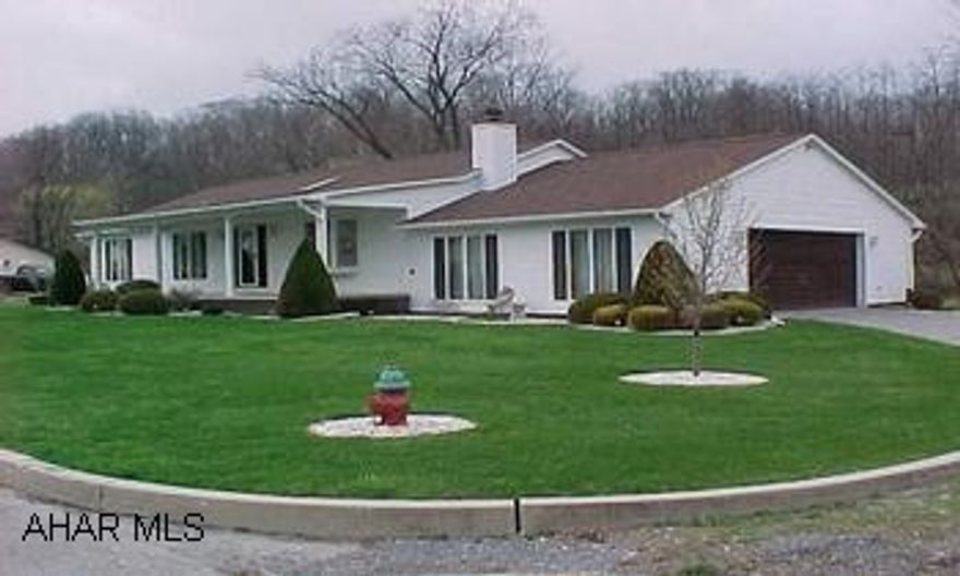 Immaculate custom built ranch home. Lots of upgrades - security system, cenral vacuum, sprinkler system,pergo floor in the kitchen, new front door w/sidelights. Possession after July 15,2007.  Property is in Zone C. Recent elevation certificate on file. .  Fireplace is currently gas but was built for woodburning-  3 skylights,French doors from dining room opens to covered porch. Nice large lot. House size is 32wx80L. Call Dianne Stultz 329-1856.