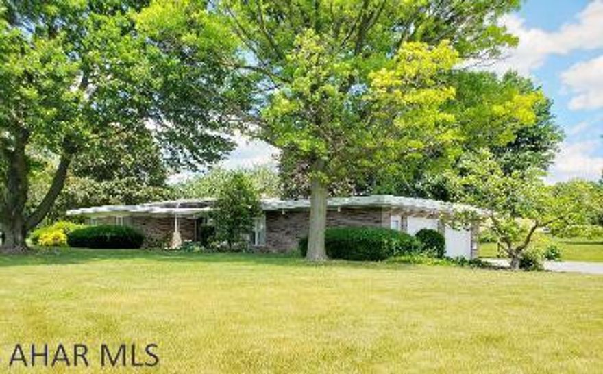 Well built brick 3-bedroom 2.5-bath ranch style home with beautiful layout, sunken Living Room with 2-way fireplace to formal Dining Room, 2 Dens, Family Room, 1st floor laundry & 2-car attached garage on private 2.02-Acre lot with great view from back yard. J-508