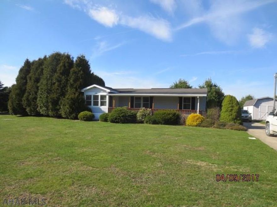 This is a manufactured home with an addition.  It is permanent and the title has been surrendered.The roof does leak and needs replaced.