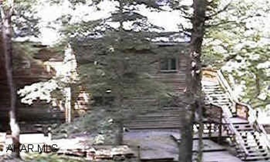 Spacious condo with loft bedroom, new hardwood floors, whirlpool tub and sunroom.  3 miles to ski resort.  Owner still doing finishing touches.  Assoc. Dues of $125/mo. includes trash, exterior maintenance, snow plowing and lawn care.