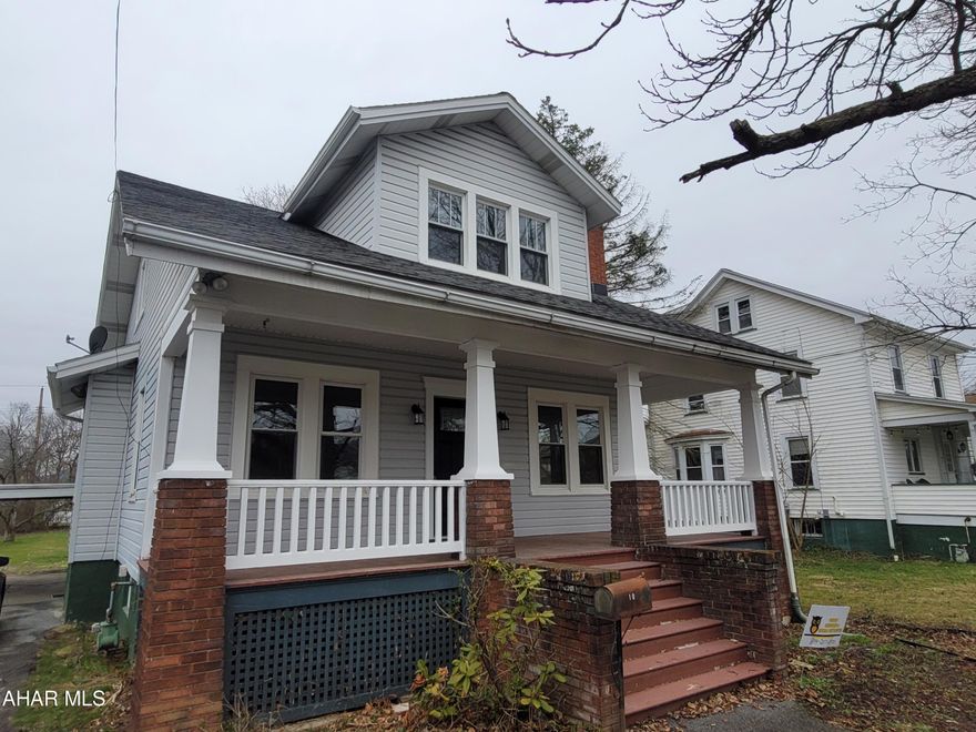 Hollidaysburg 1920's Craftsman Bungalo with brick accents. Come see this 3 bedroom 2 bath with all the modern upgrades! Huge master bedroom with large full bathroom and plenty of space for a sitting room and office area too! Home has a beautiful kitchen with new appliances and butcherblock countertops. Original refinished hardwood floors and past year charm! Large front porch and large yard out back. Home as elevation cert and does not require flood insurance.