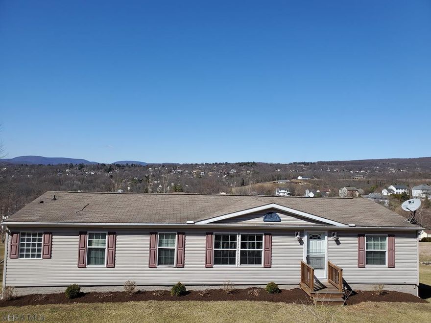 A welcoming open floor plan with 3 bedrooms 2 full baths, living room/ dining room combo, plus a laundry room.  The MBR bath with double sinks, free standing soaking tub, step-in shower. Oh, I forgot, it has a large finished basement. New heating system.  On a block foundation with surrendered title. So much more!!! Motivated to sell!