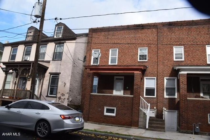 Remodeled townhouse with hardwood floors in living room and dining room,  ceramic tile in kitchen, new carpeting in spacious bedrooms.   First floor half bath.  New composite decking on front porch.  Short walk to the Diamond in Hollidaysburg for all borough activities.   Fenced yard.  Move right in.  No work to be done.