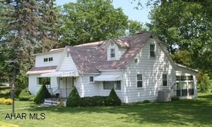 Charming 3BR/2BA Cape Cod home with pleasant country setting. Charming 3BR/2BA Cape Cod home with pleasant country setting. Large yard with trees and stream. Galley kitchen w/eat-at counter; dining nook w/built-in hutch. Formal DR, spacious LR with fireplace. Bright and cheery enclosed Sunroom has ceiling fan, gas heat stove and insulation....could easily be finished as a Family Room. Won't last long.