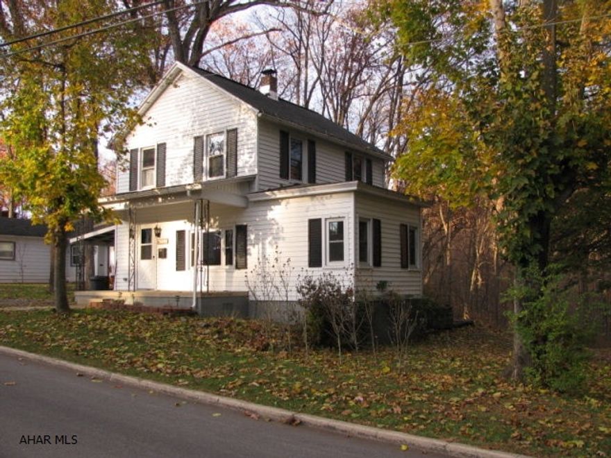 Adorable 2 story vinyl sided Tyrone home! Spacious LR. & Dining room with HWF, EIK, 1st floor powder room. 3BR 1 full bath . All on a beautiful lot near schools and athletic fields