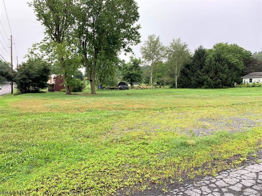 This level lot would be a perfect building site for townhomes, apartments, or a single-family home. Public water, sewer, electric and natural gas. Corner lot, close to downtown Bedford but in Bedford Township with no zoning.