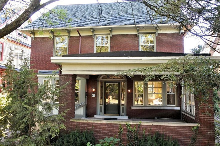 H-Burg brick charmer with fenced-in English garden, perfect for children or pets. Home features beautiful oak plank and peg floors on 1st floor and hardwood floors throughout. Large living room and formal dining room with original leaded-glass windows and crown mouldings. Updated Kitchen, Quartz C-tops, new stove. 3 second floor BRs with relaxing overlook, 2 additional bedrooms on a private third floor, an updated gas furnace, landscaped backyard with pass through driveway onto a back alley...no backing out onto Penn St. Truly a Borough gem, this is an amazing find in the heart of Hollidaysburg. Within walking distance to all  schools tennis, baseball, basketball and athletic fields, the public library, YMCA, Historic District and eateries.  Freshly painted, renewed floors, great bones.