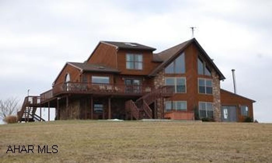 multi level cedar home 5 bedroom 3 full baths cedar home on 34+- acres stone fireplace, wraparound deck, jacuzzi tub, central vac, geo- thermal heat, pond on.