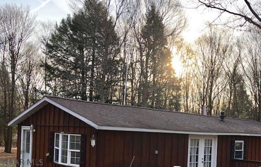 Home being sold as is, no heat or electricity on at present.  This started as a single wide mobile home and was built around and added on to.  This property will not qualify for financing.