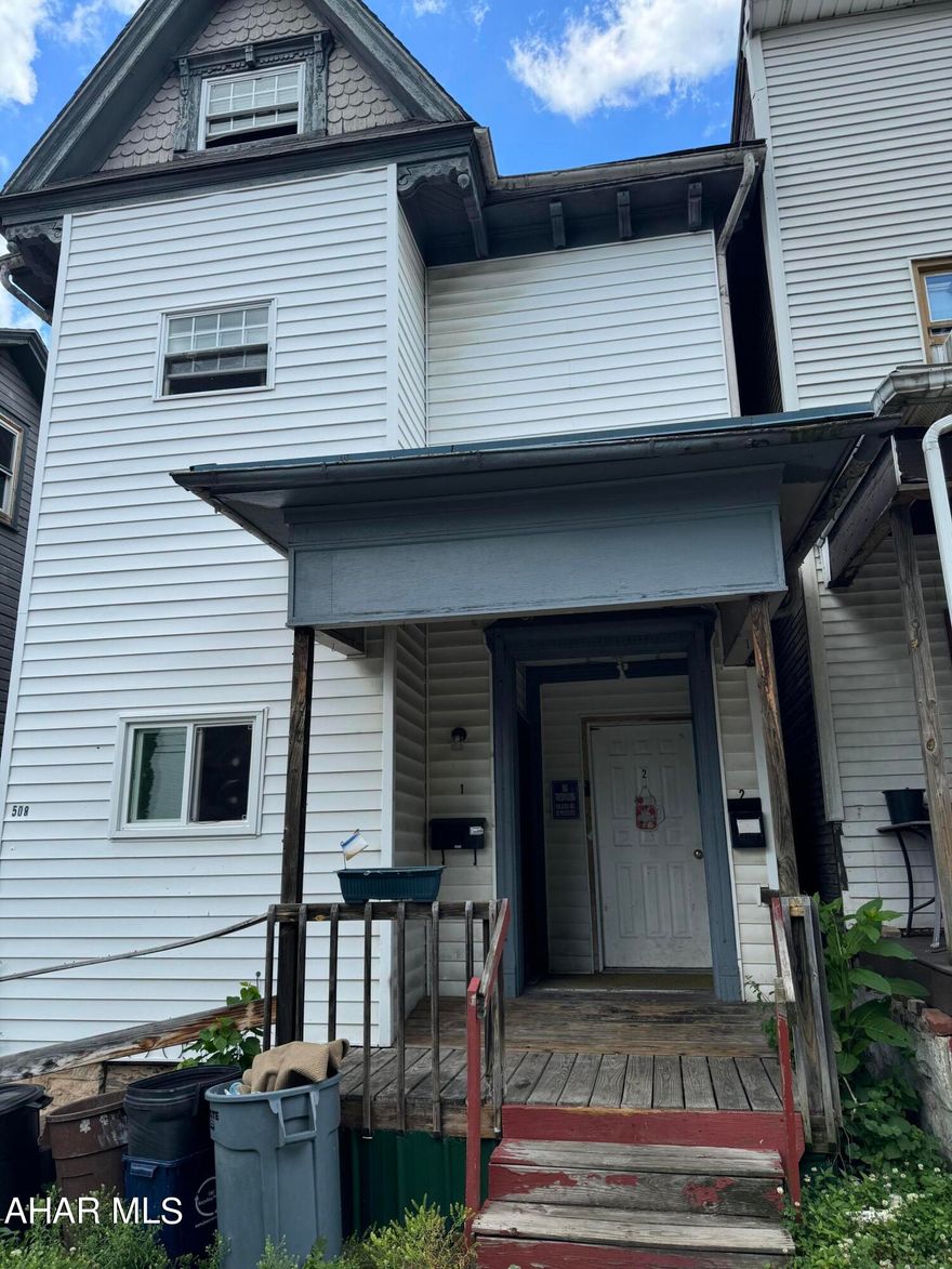 Current rent is $600 for upstairs tenant, $700 for downstairs tenant. Landlord pays water and trash. 1 year leases. 1st floor is vacant, top floor is occupied and plans to stay.