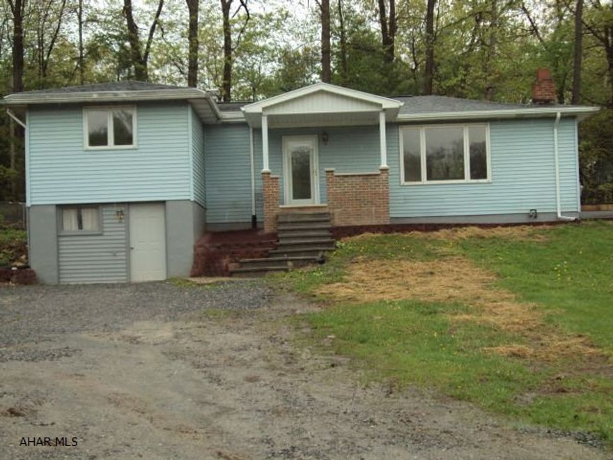 Nice home with some upgrades. New roof, new front porch, some hardwood floors, new bathrooms, one in the basement 3/4. Huge fenced yard.