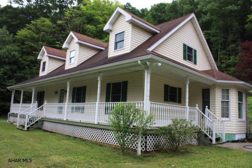 Seclusion yet close to town on 20 acres. This is a rare opportunity to enjoy a completely private setting yet drive 5 minutes into town.  This is a stunning Cape Cod home with exposed beams and hardwood floors throughout.  This home features a Fine-Line Kitchen, radiant heat floors in the master bath and music room as well as a majestic floor to ceiling wood burning stone fireplace.  Owners have spared no expense expanding the home with a 4 season wood paneled music room and have upgraded the master bath with premium fixtures and tile work. Property to be subdivided from 165 total acres, taxes will be adjusted - on clean and green.  Additional 192 acres available separately for $300,000- contact listing agent for details.