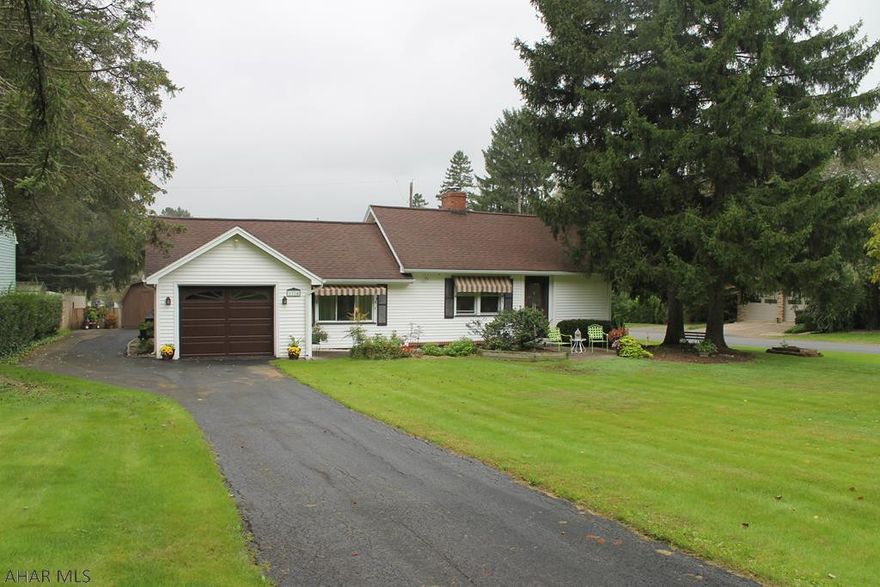 Charming house on a corner lot in desirable Bellmeade area of Altoona (Bellwood schools).  Current owners only use 2 bedrooms, but bonus room could easily be made into a 3rd!  This house has been well cared-for and is ready for its next owners.  Also enjoy the large covered patio out back, the grape vines and gardens, and unique circle driveway.