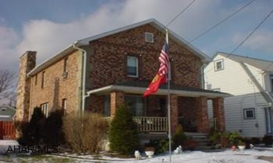 Classic beauty with modern flair within walking distance to Altoona Campus.  This 4 bedroom 2.75 bath home offers hardwood floors, natural woodwork, beautiful step down family room with stone and marble fireplace, oak kitchen with ceramic tile, master bedroom suite features vaulted ceilings and fireplace with an oak and marble surround, and a walk in closet.  Entertain around the 16x33 inground pool.  Don't miss this bigger than it looks brick beauty.