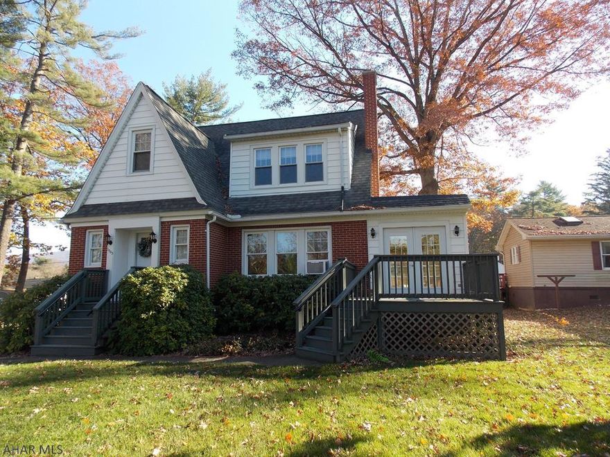 This charming home with great curb appeal sits on a lovely .65 acre lot on the Antis Twp end of Bellemeade Drive.  You will love this location!  Flat lot, beautiful trees, plenty of parking even for an RV and still room for the kids to play.  Inside of this brick home you will find 3BRs & 1.5BAs, an eat in kitchen plus a DR, LR with a wood burning fireplace, an office and a sunroom.  New windows and doors, newer roof and furnace will add to this homes appeal. This is definitely not a cookie cutter home!  Seller thinks there are hardwood floors under the carpet in LR and DR. Schedule to see this home today before it's gone.