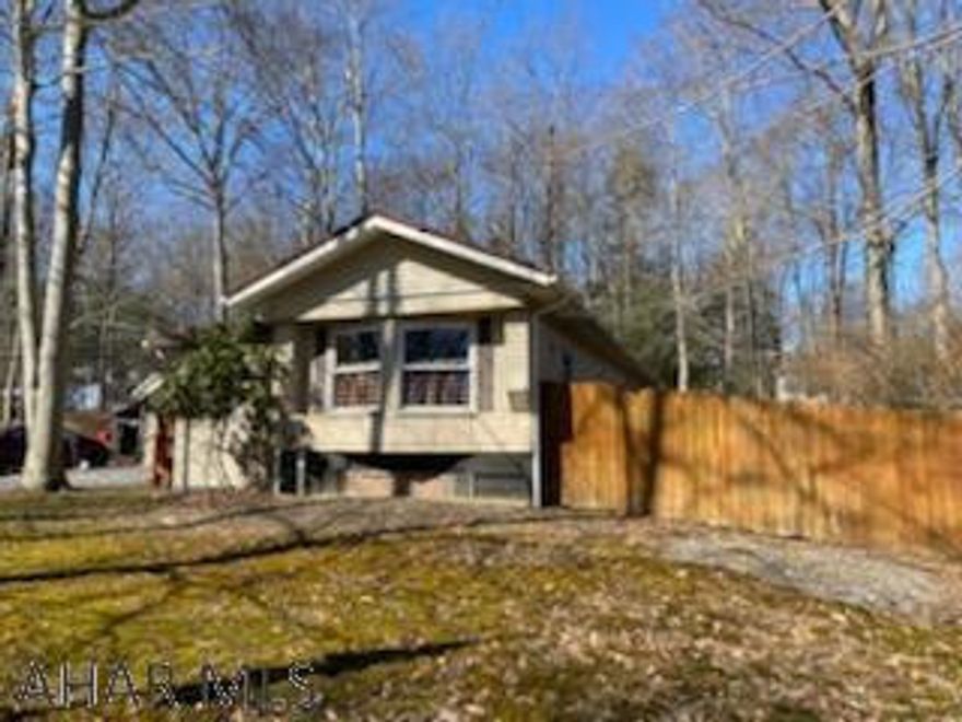 Charming and updated 1 story manufactured home in Glendale Year Round. This home features 2 bedrooms and 2 bathrooms, a large eat-in kitchen, beautifully beamed ceilings in kitchen and living room. The front room and living room both have fireplaces for cozy winters!  The spare bedroom has 2 roomy closets, and the master bedroom has a large closet with mirrored doors. The master bathroom is a spacious ensuite, with separated his-and-hers sinks. The shared bathroom has a stand-up shower. So much natural lighting! All appliances and wood burning stove are included.  1 car garage with garage door openers. Fenced in back yard. Most of this home has been updated and renovated within the past decade. Come see for yourself! Call for your tour today!