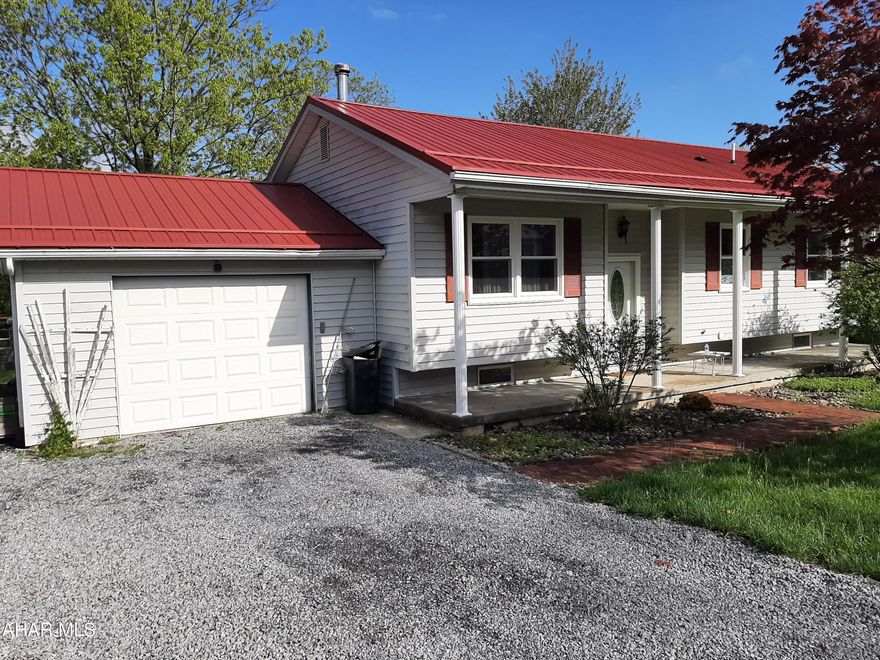 Move right into this 3 bed, 1 bath home in the Penn Cambria School District. This home offers a one car attached garage, galley style kitchen that is open to the dining area and living room. There is a wood burner for a back-up heat source. The full bath is updated and offers plenty of storage. The bedrooms offer plenty of natural light and storage. The large flat, fenced in back yard offers privacy and a deck for outdoor entertaining. Or relax on the large covered front porch. Many nice options for this home. New windows and newer roof will give you piece of mind with this home. Call for your showing today!