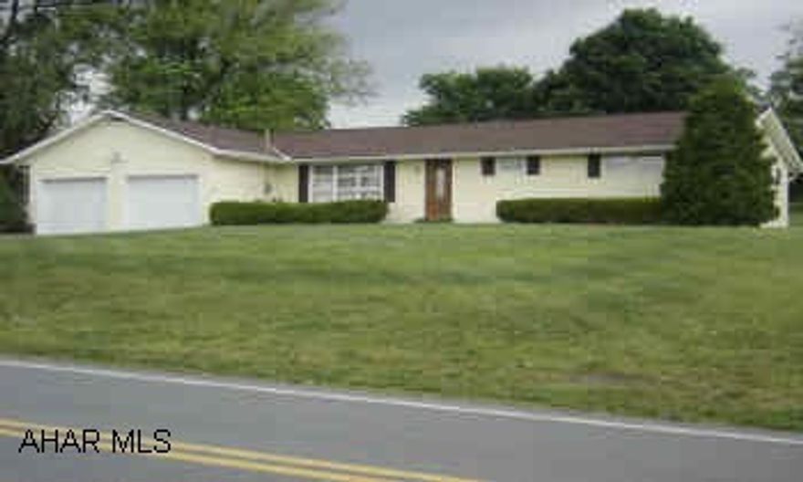 3 Bedroom Vinyl sided ranch on .5 acres.  Includes large master bedroom with pergo floor, 2 car attached garage, heat pump, and is adjacent to the Chestnut Ridge School, great for kids! Terrific location in this nicely improved 3 bdrm ranch!  Vinyl sided, central air, master bedroom,  nice views!  Call Tina Boozer to show (814-623-3295) (814-242-2047). Co-listed with Chris Bullington.