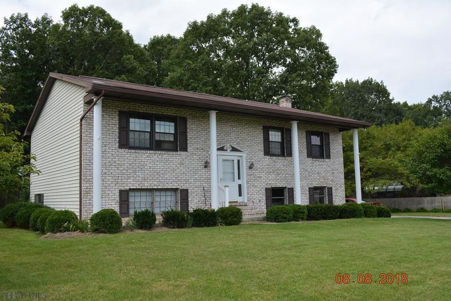 Very spacious 3 bedroom bi level home. This home is located in Woodland Terrace on a  110 x 120 level lot with  2 car garage central air condition and a back deck that views a private wood area for sitting out on those beautiful summer evenings. Includes refrigerator, stove, microwave and dishwasher. Ready for the new owner's personal touch to make this their perfect home.Owner is very motivated bring us an offer.