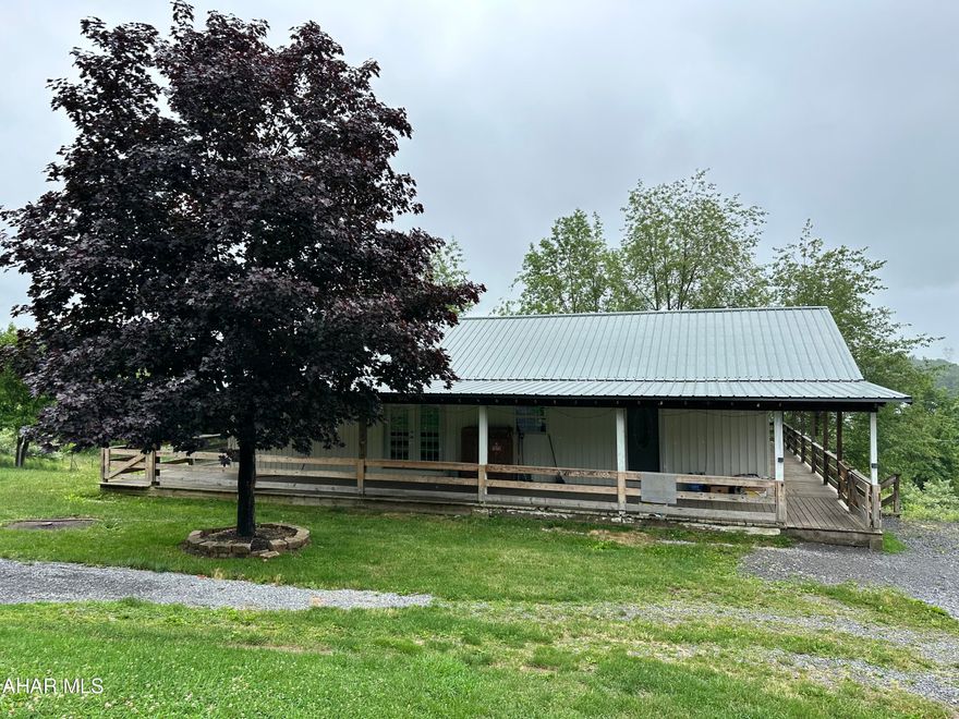 Come enjoy the privacy of this 1 story modular home located on 1 acre in the Bellwood school district. The main floor offers 3 bedrooms and 2 baths, vaulted ceilings, french doors the lead to a 4 sided wrap around covered porch. This home has a newer metal roof, newly remodeled lower level with 2 bedrooms, full bath with laundry, Kitchenette and re room area. 2 car detached garage. Recent survey.