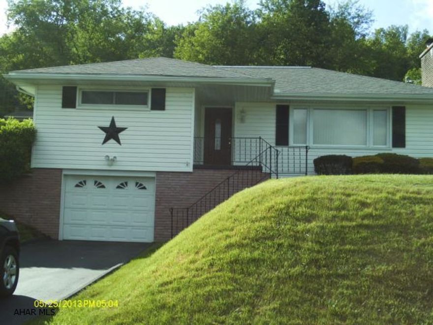 Immaculate condition 3 bedroom, 2 bath, split level. Lots of storage closets, main bath has jacuzzi tub, stone wood fireplace, newer roof and furnace, hardwood floors under carpet throughout, absolutely move in condition.