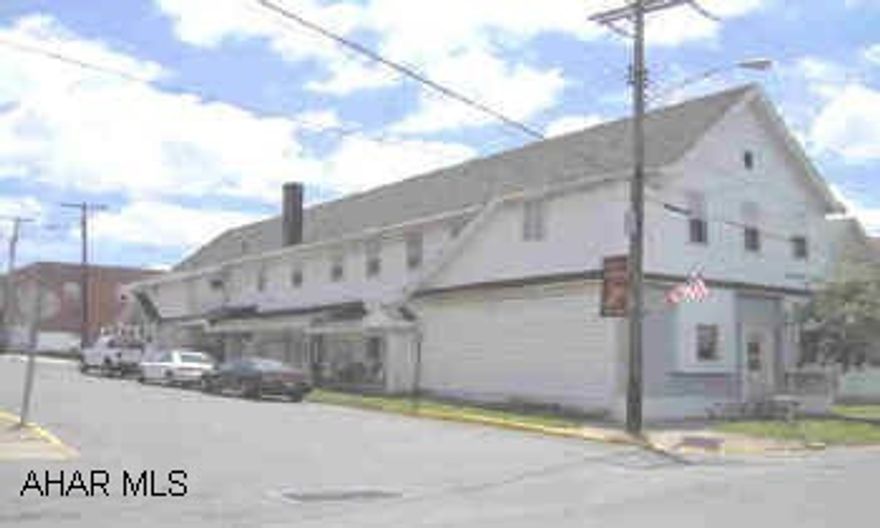 Great investment! 6 unit apt building with workshop. Agent owned. $125,000 Call Archie for details! Great investment! 6 unit apt building with workshop. Agent owned. $125,000 Call Archie for details!