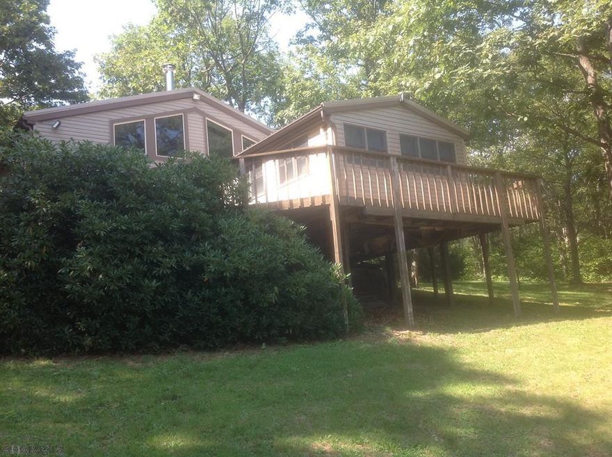 If you are looking for a weekend retreat or a full time residence or want to start a private air B&B this is a completely furnished chalet with a million dollar view. It comes with over 8 wooded acres that would make for awesome hunting with abundance of wildlife such as turkey,deer and bear.              *****  Second partial with this property  B.06-F.05-055 ****