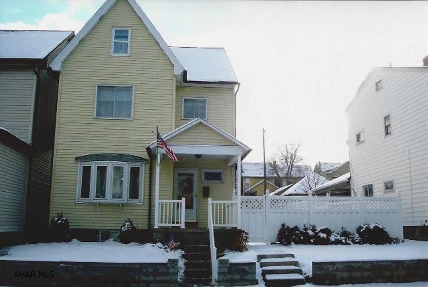 Dirt floor in basement. All appliances included (no warranty on appliances). 2-C carport in rear for off street parking. Nice vinyl privacy fencing. Double lot. First floor laundry. Attic is finished, but not heated. Sunsetter awning at rear of house. Furnace and HW tank are reportedly recent. This is a sale of an estate by executrix, therefore, there is no sellers disclosure statement. This is a house a buyer could move right into and be comfortable. Vinyl siding, replacement windows.