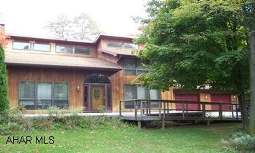 Great home.  Large living room open to 2nd floor loft area.  Great private location. Beautiful setting.  Lot size to be approx. 2.5 acres. Currently awaiting township final approval. Great home.  3 bredrooms 2 full baths.  Wheelchair accessible.  Gorgeous private setting on approx. 2.5 acres.  Large living room diding room open to the 2nd floor.  Partially finished basement with additional bedroom and full bath.