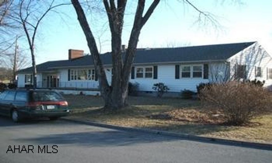 House sits on a nice lot. Large back yard, surrounded by privacy  fencing.  Landscaped, pond, great for entertaining. Very large house in boro.  Centrally located close to all schools.  Perfect family home.  4 bedrooms & 2.5 baths.  Huge living room with fireplace.  Hardwood floors throughout.  3 + car garage.  New roof in 2006.