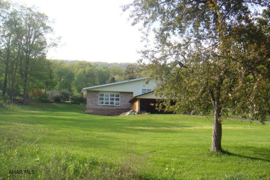 Multi level home in desirable Sinking Valley. Beautiful hardwood floors in bedrooms. Home is in need of updating but has plenty of potential.